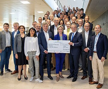 Übergabe KI-Förderbescheid