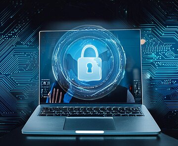 Dieses Bild zeigt einen Laptop mit Sicherheitsschloss im Display