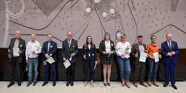 Das Bild zeigt Engagierte im Sport und im Umwelt- und Naturschutz.