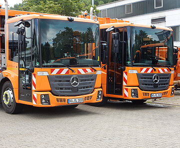 Zwei Müllfahrzeuge