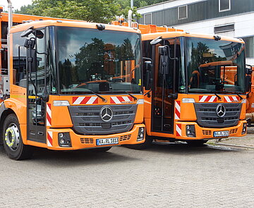 Zwei Müllfahrzeuge