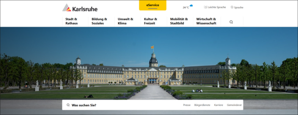 Das ist ein Bild von der Internet-Seite der Stadt Karlsruhe.  Es zeigt die Start-Seite mit der  Kopf-Zeile,  dem Haupt-Menü und  einem Bild vom Schloss in Karlsruhe.