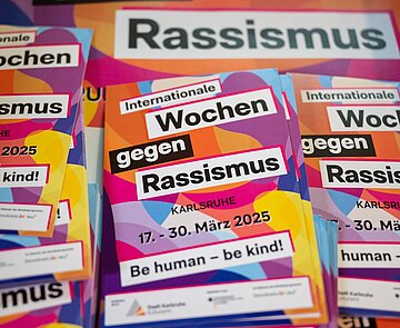 Flyer zu den internationalen Wochen gegen Rassismus 2025 in Karlsruhe