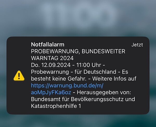 Screenshot eines iPhone-Bildschirms mit Probewarnung des Bundesamts für Bevölkerungsschutz und Katastrophenhilfe