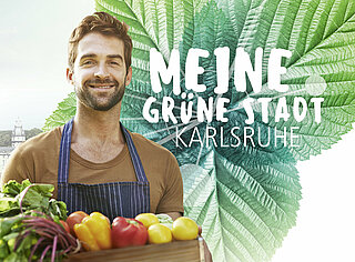 Logo Grüne Stadt Karlsruhe; Mann mit Gemüsekorb in der Hand