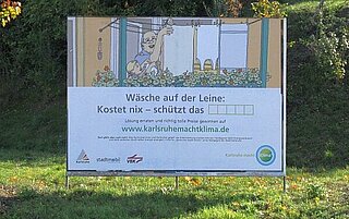 Großplakat zum Kampagnenstart "Karlsruhe macht Klima." - Motiv Wäschetrockner