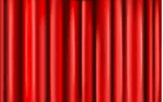 Das Bild steht symbolisch für die Volksbühne, die Programme an diesen Theatern anbietet. Es zeigt einen Auschnitt eines roten Theater- beziehungsweise Bühnenvorhangs.